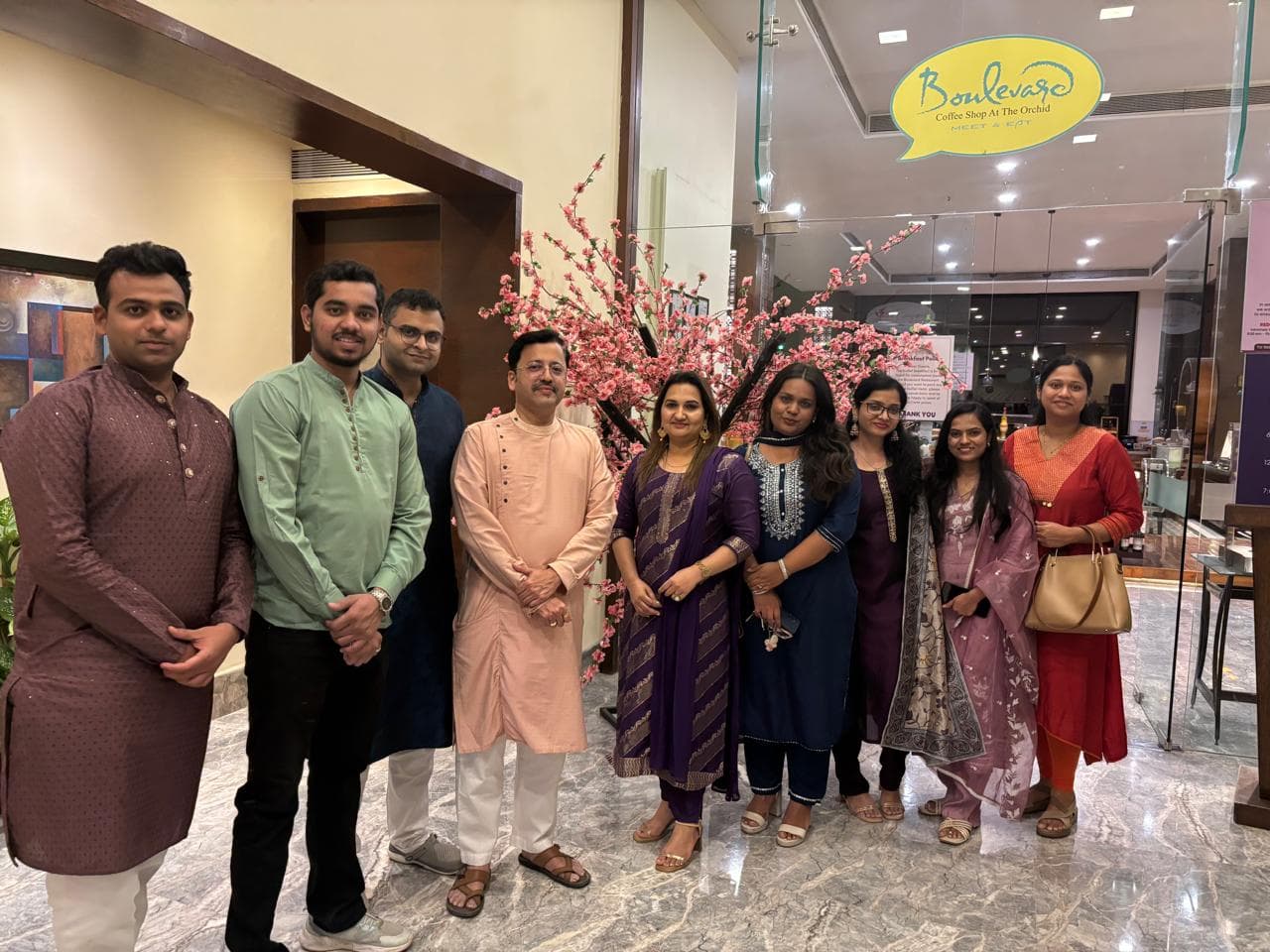 VSquare team members celebrating together during a festival